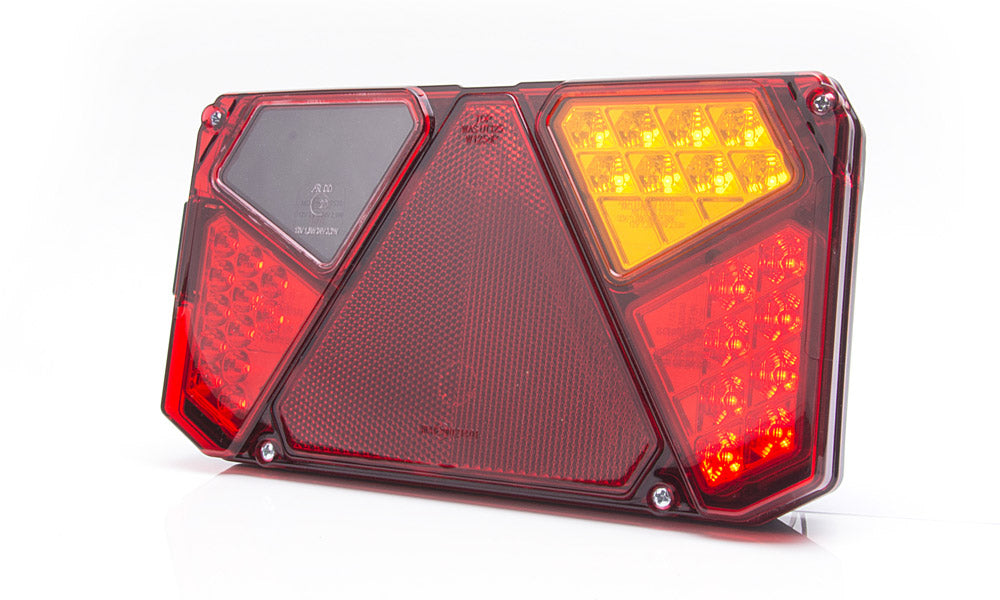 "Front view of W125DL/W125DP LED rear tail lamp featuring integrated stop, tail, indicator, fog, and reverse lights within a triangular lens design.