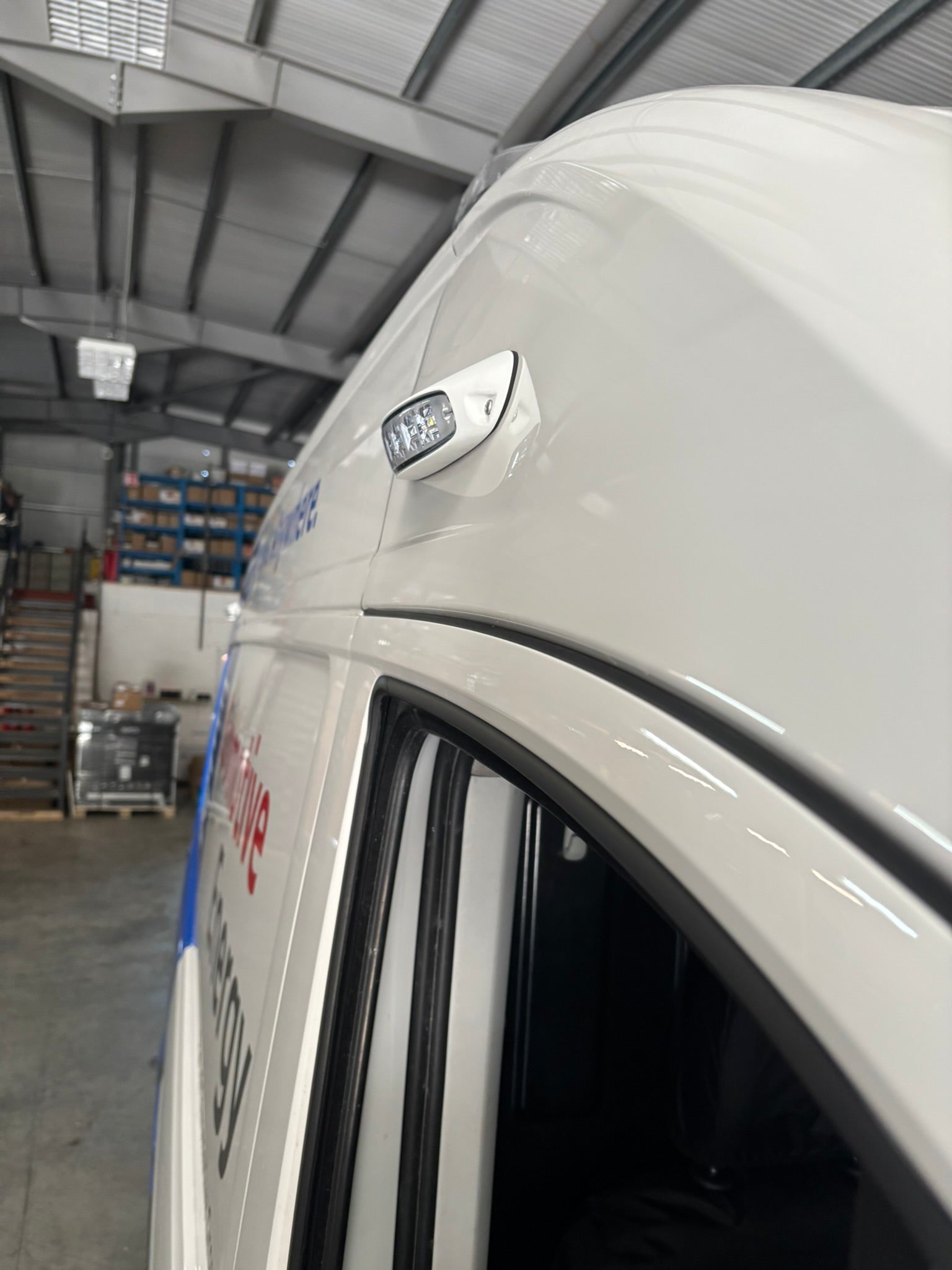 SL209 LED scene light surface mount 12V 24V
compact LED utility light for vehicle exterior
side view of SL209 SceneLite LED flood light
mounted SL209 LED scene light on emergency vehicle