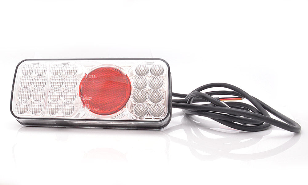 Rear Comb Lamp Stop/Tail/Ind/Fog Clear Lens W66L - Euromotive Lighting & Signal